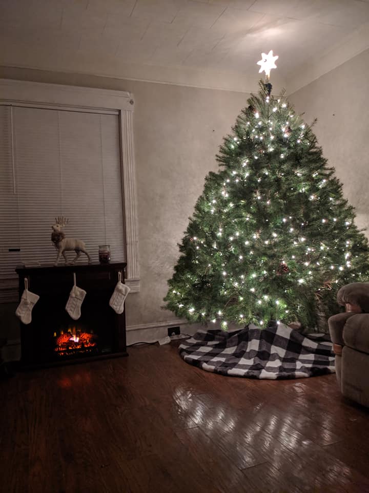 Christmas Traditions include decorating a tree with family and friends.